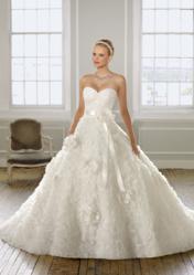 Organza with 3-dimensional flowers. Sizes available 2 - 28.